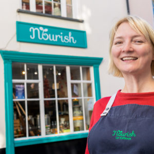 Woman outside shop